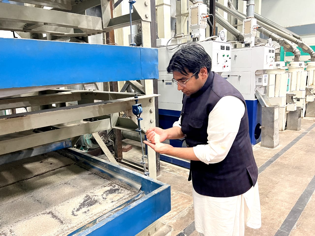 Owner inspecting Rice Quality